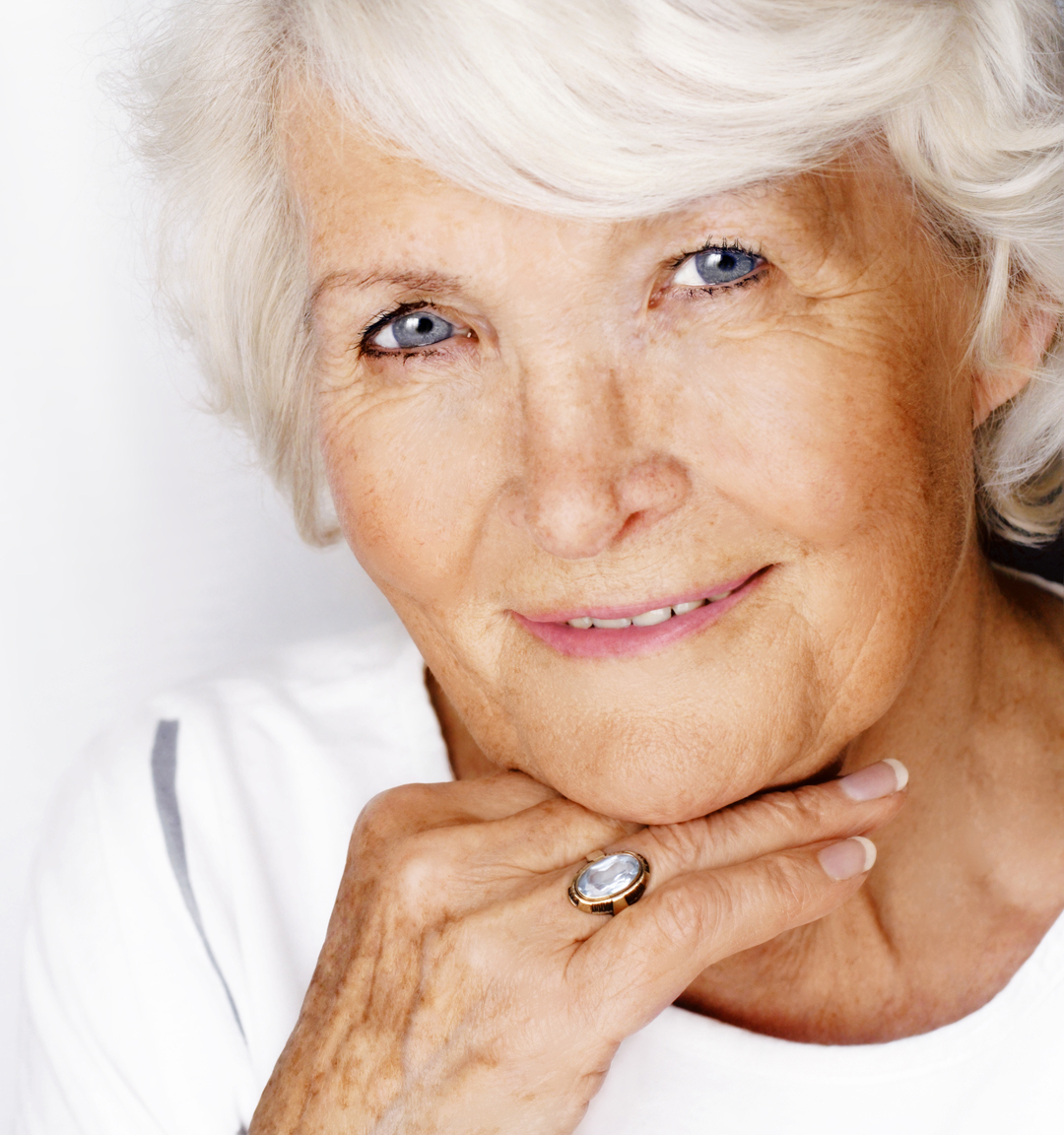 Senior woman smiling with home health aide